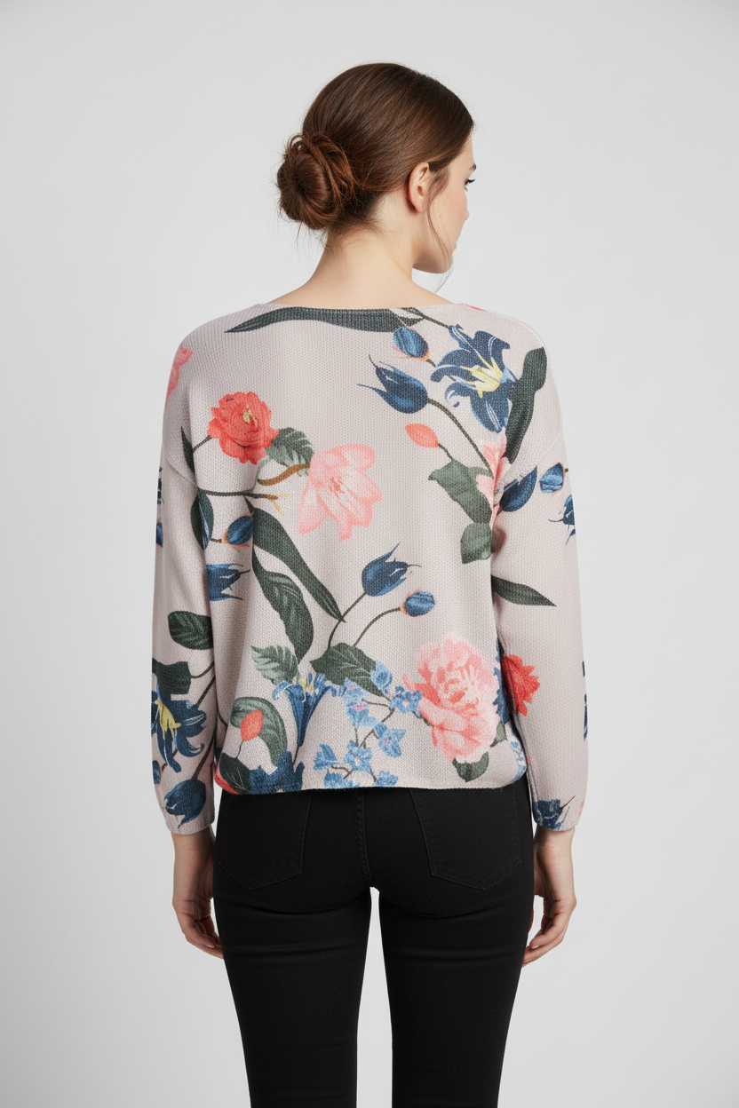 Front view of floral sweater on model