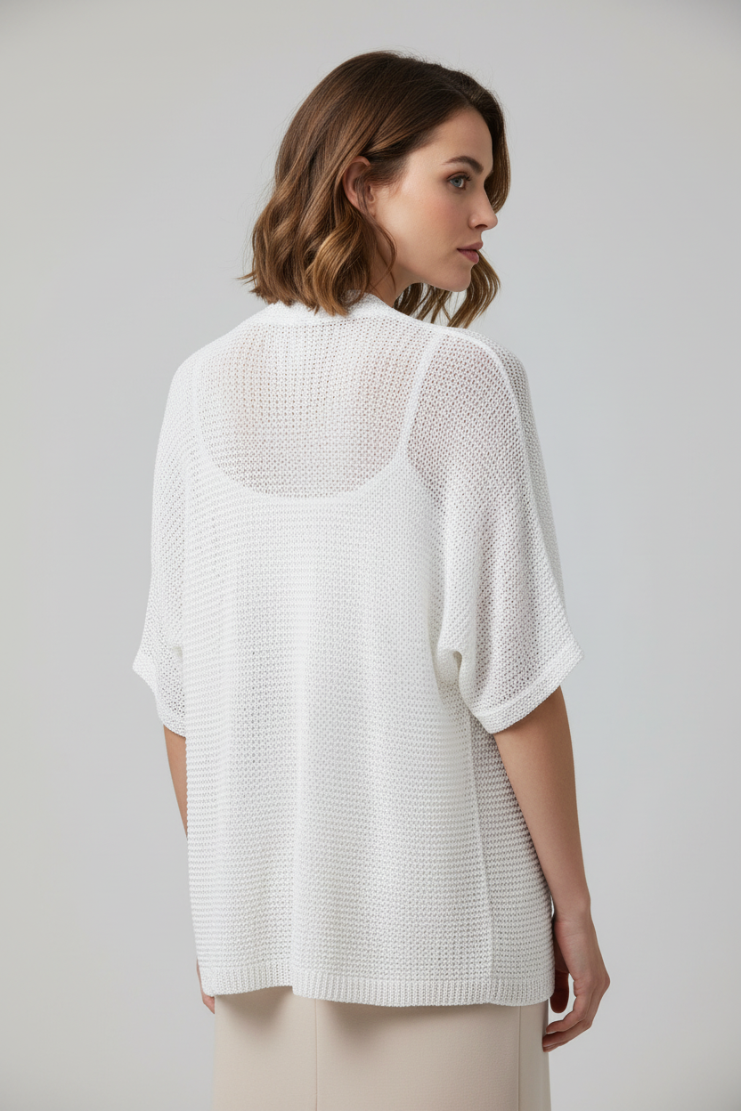 Front view of white cardigan on model