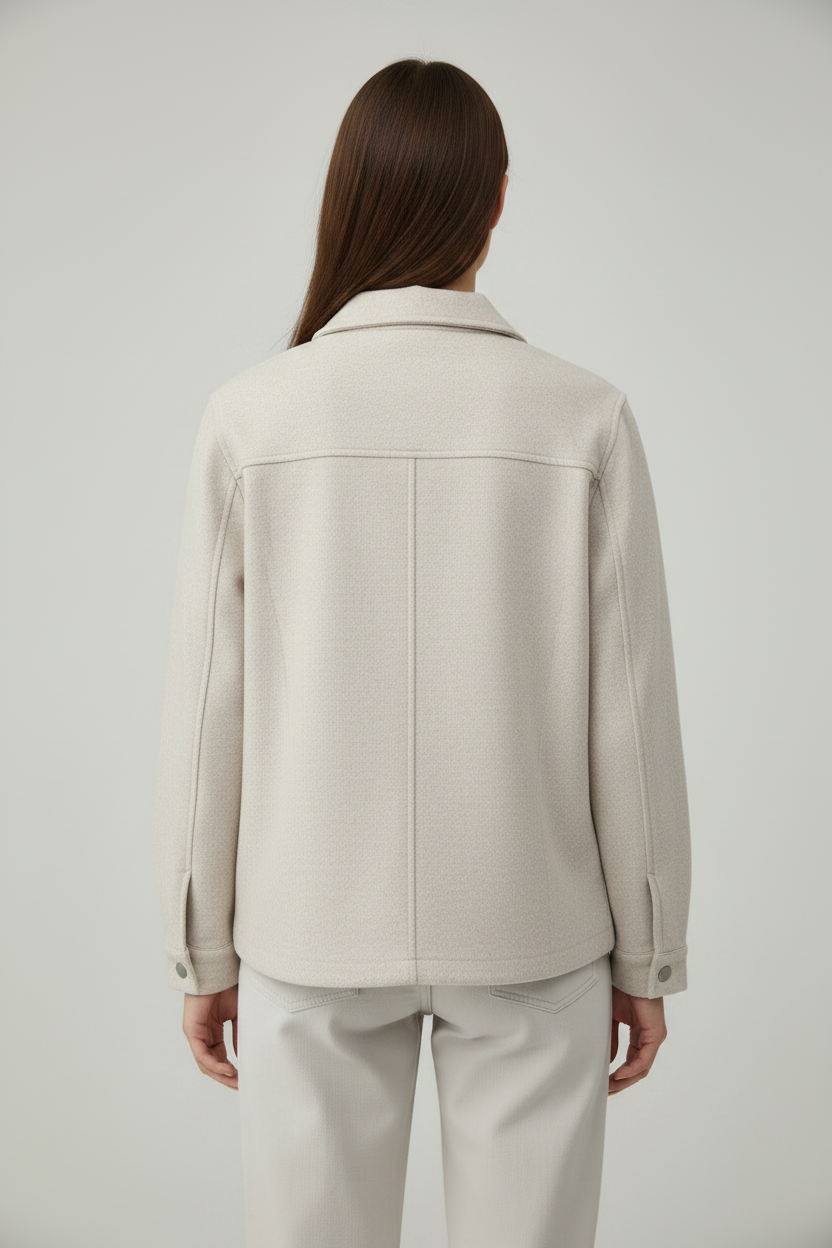 CS the Label beige collared fall jacket on a woman, front view with snap closure and lower flap pockets.