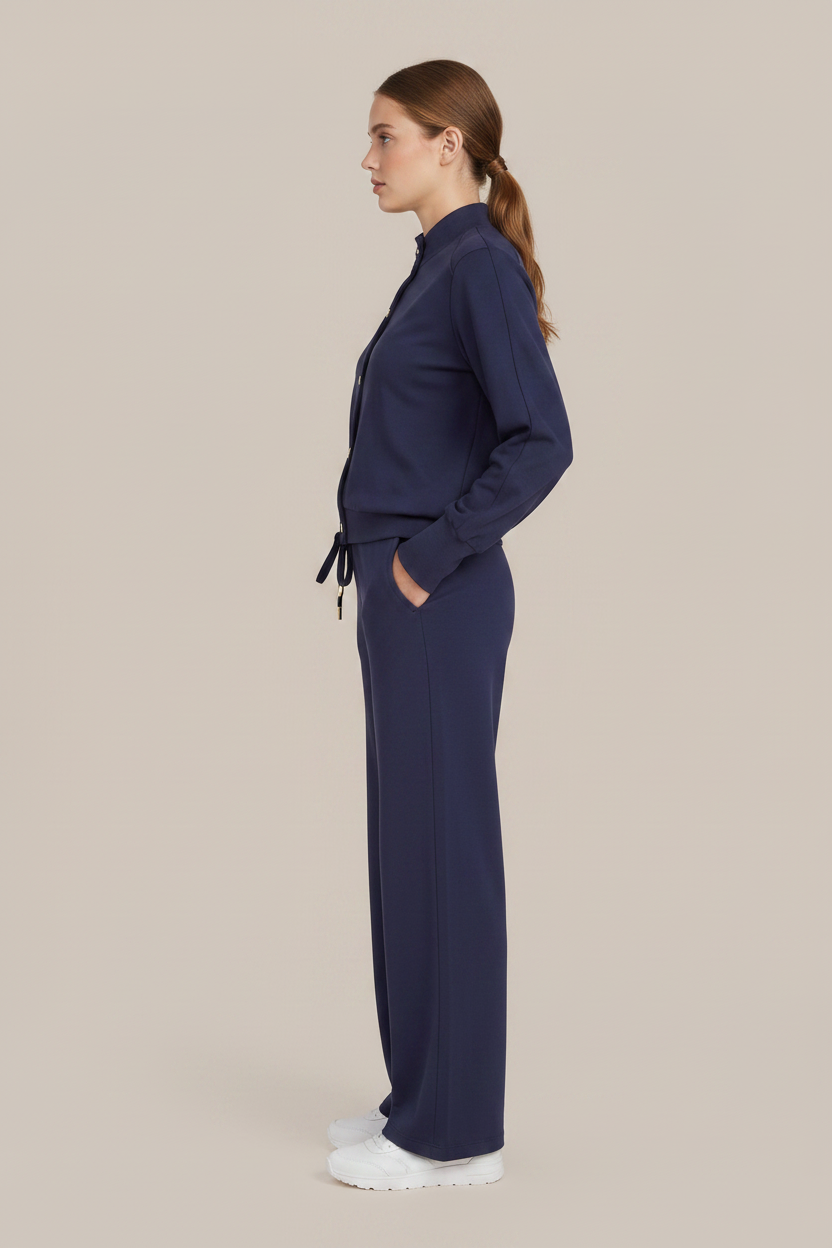 CS the Label navy button-up jacket and matching straight-leg pants on a woman, full front view”