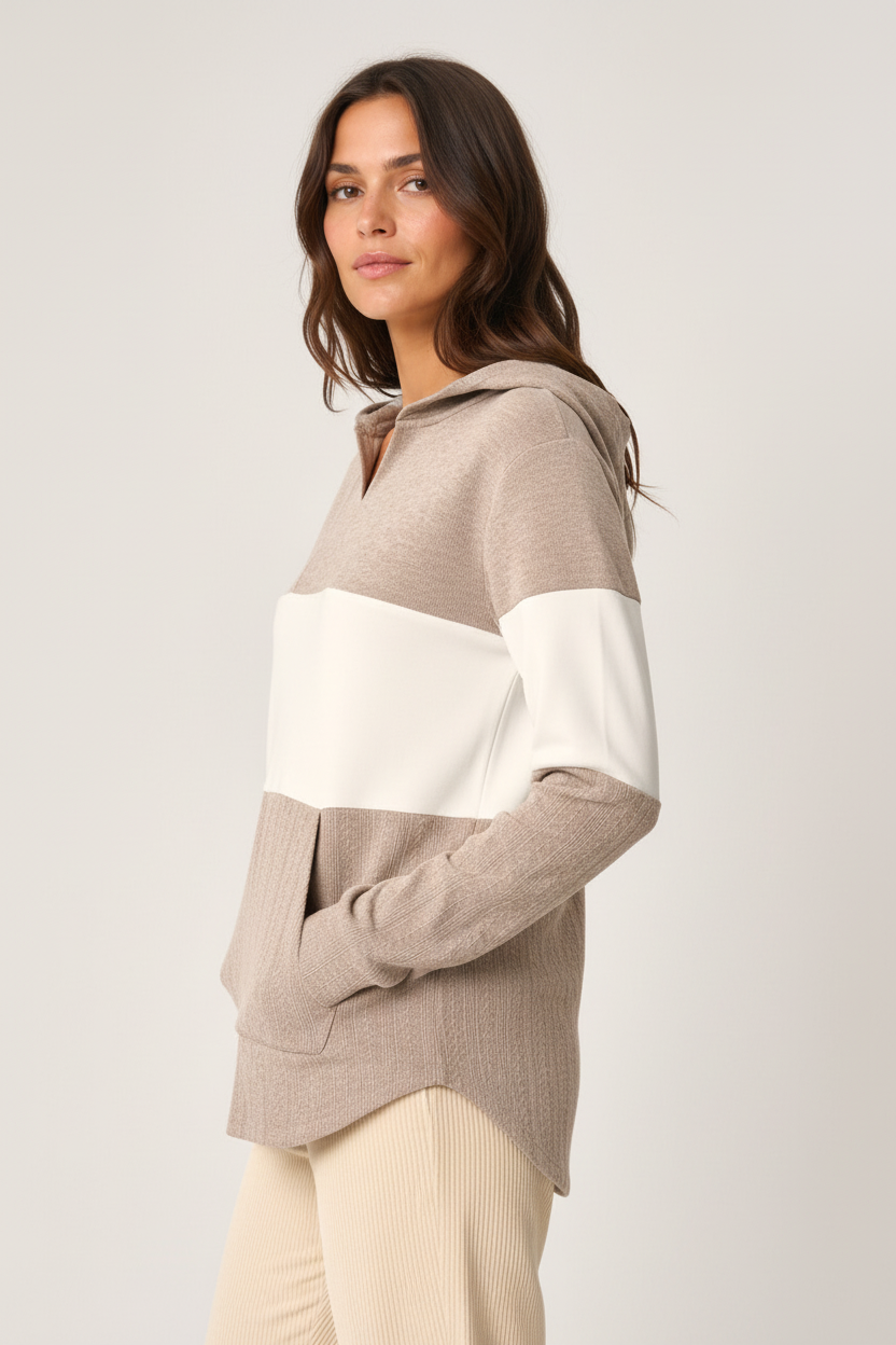 Point Zero black knit cardigan on a woman, back view showing long sleeves and clean knit back
