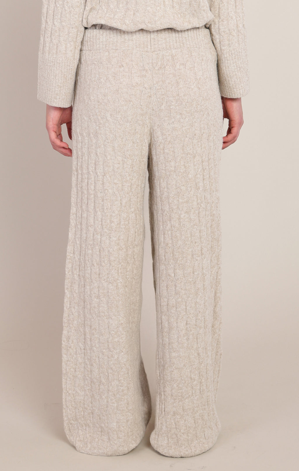  Room 34 ivory cable-knit pants showing relaxed straight legs and soft textured finish