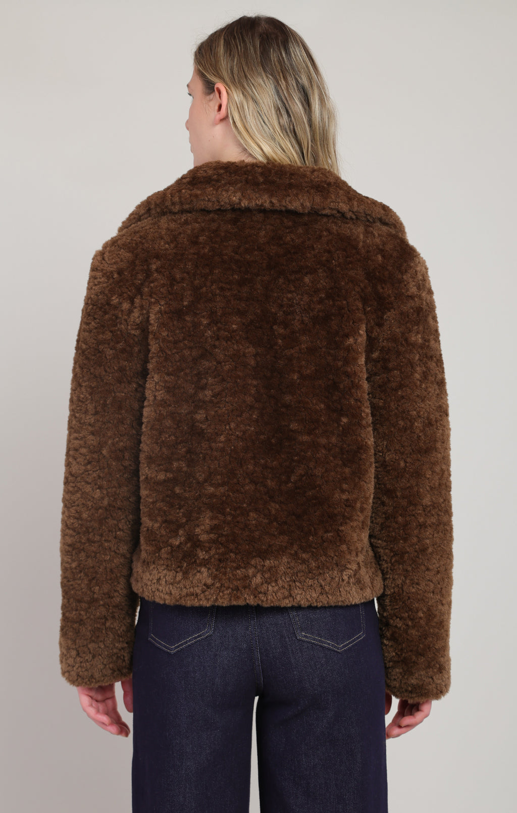 Room 34 brown faux fur coat with wide collar, button front and dark trousers