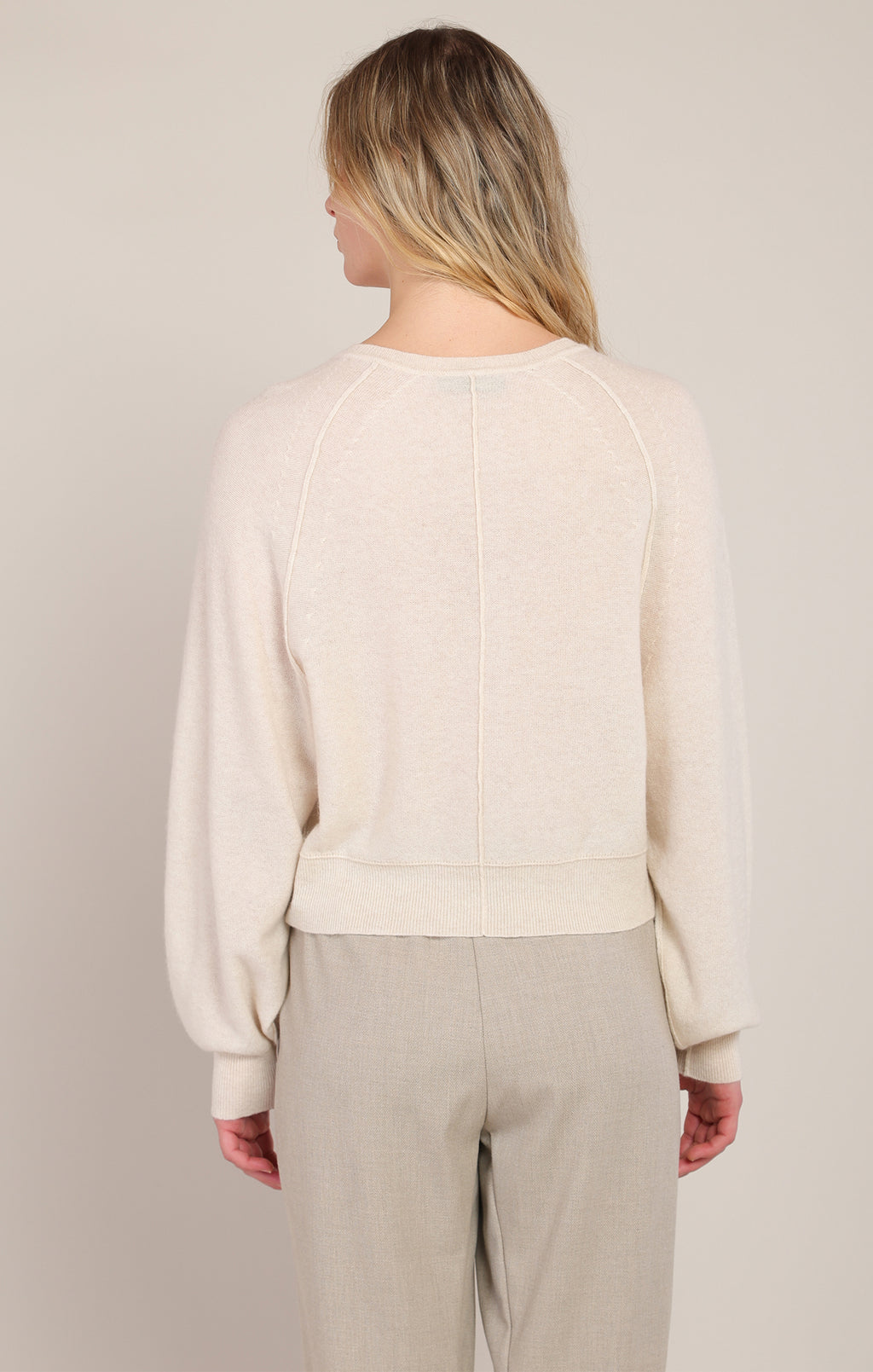 Room 34 Henley Sweater in beige – front view, relaxed raglan fit