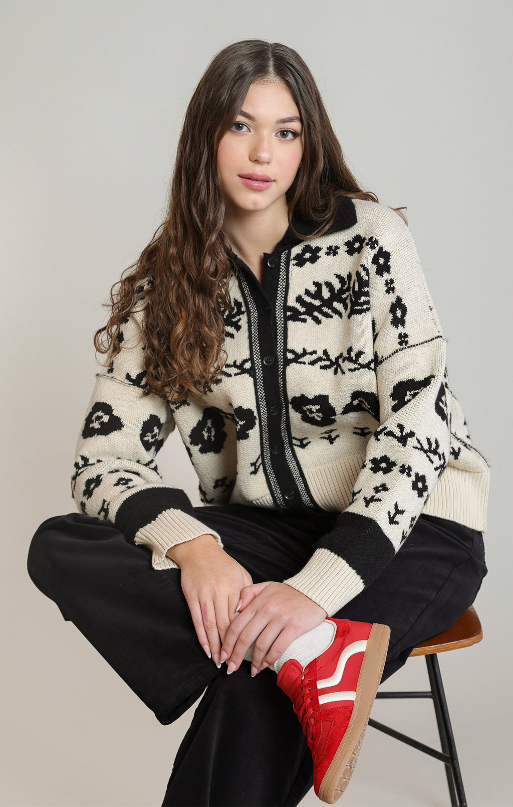 Dex ivory and black flower jacquard cardigan, close front view showing collar and button closure