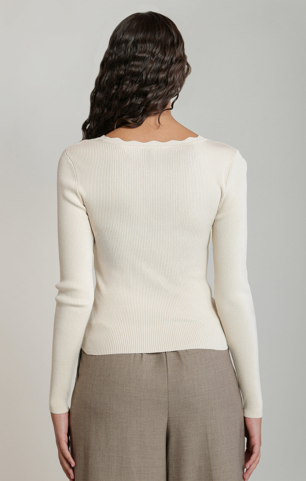 Dex cream ribbed sweater, front view showing scalloped neckline and fitted long sleeves